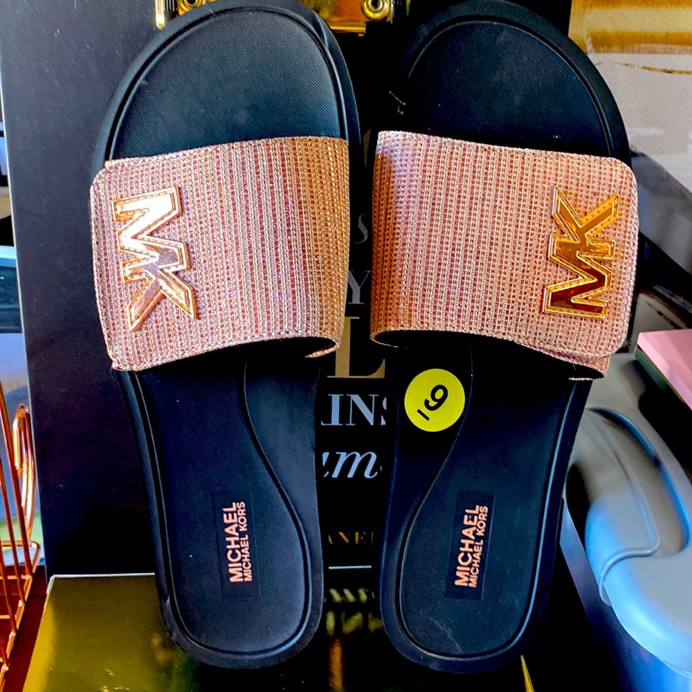 Michael Kors Rose Gold slides.